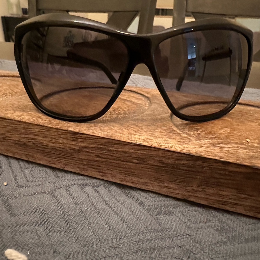 Authentic Chanel Black Sunglasses . Med frames with small arms.